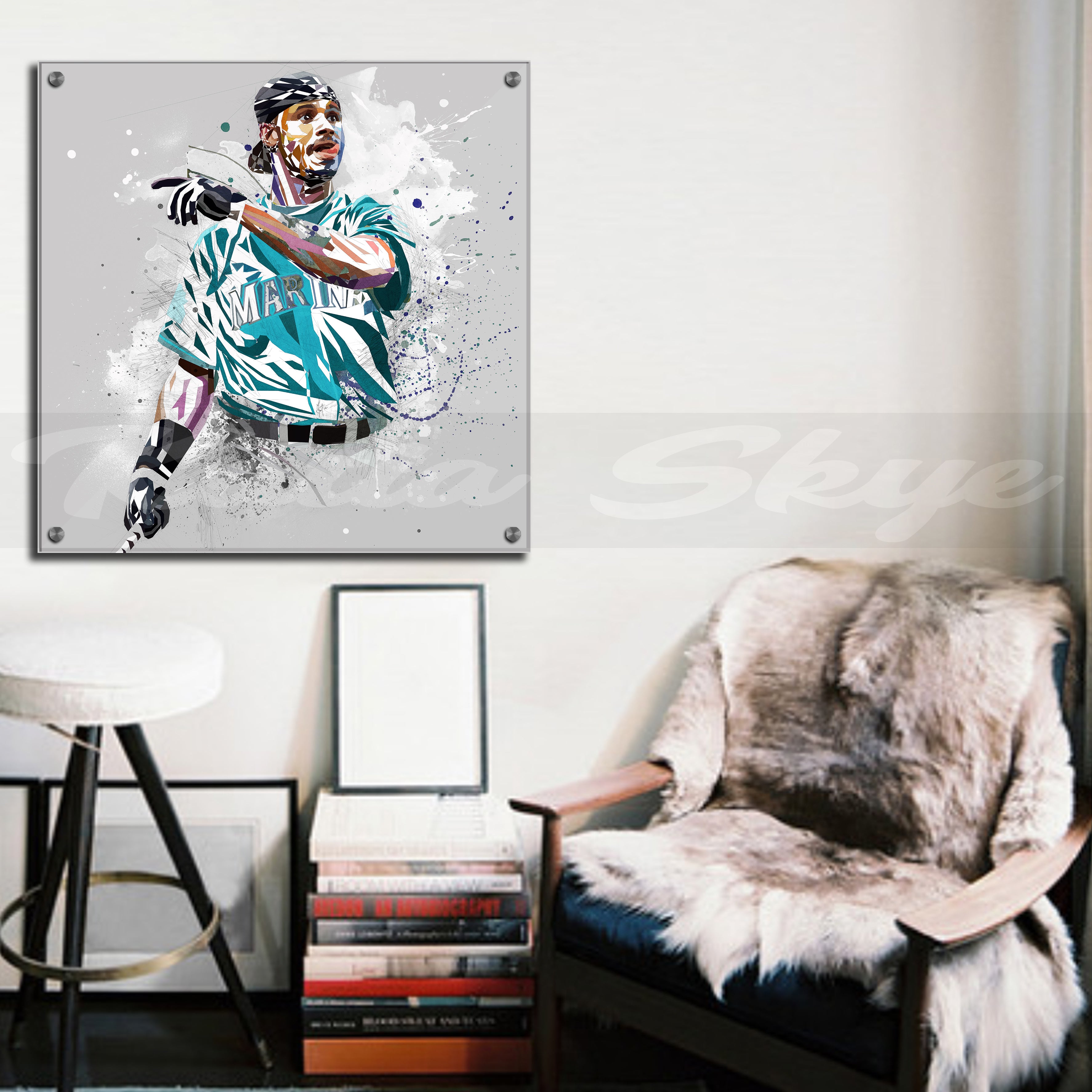 Acrylic artwork of Ken Griffey Jr on a wall above a chair with a fur cover.
